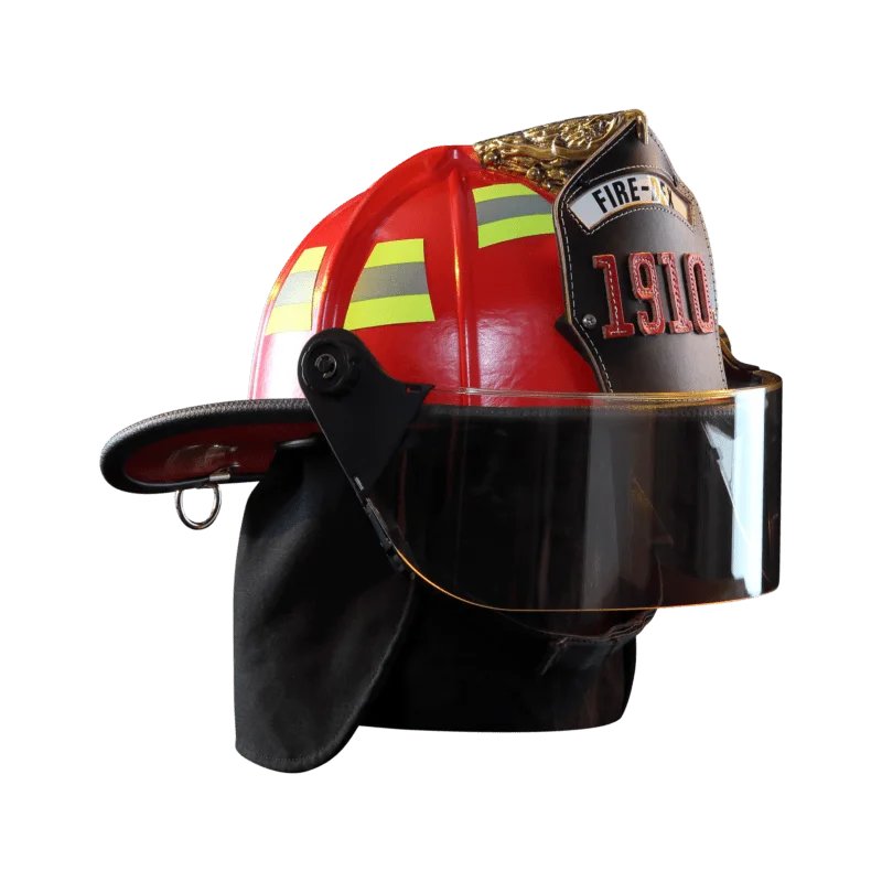 Front right side view of a Fire-Dex® Traditional Helmet in red, displaying protective shell, visor, and ergonomic construction.
