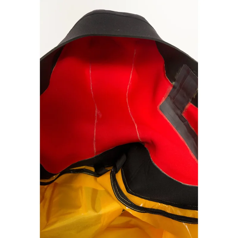 Close-up of interior lining and insulation inside Mustang Survival® Ice Commander Rescue Suit for thermal protection.