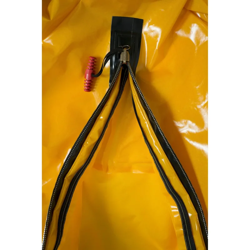 Top view close-up of opened chest zipper on Mustang Survival® Ice Commander Rescue Suit showing detailed construction.