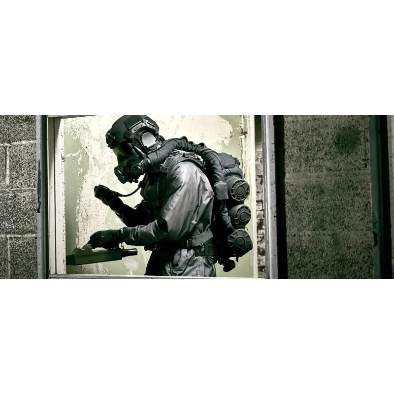 Person equipped with Avon Protection CS-PAPR™ Powered Air Purifying Respirator System along with their respiratory gear, demonstrating complete powered airflow protection in hazardous environments.