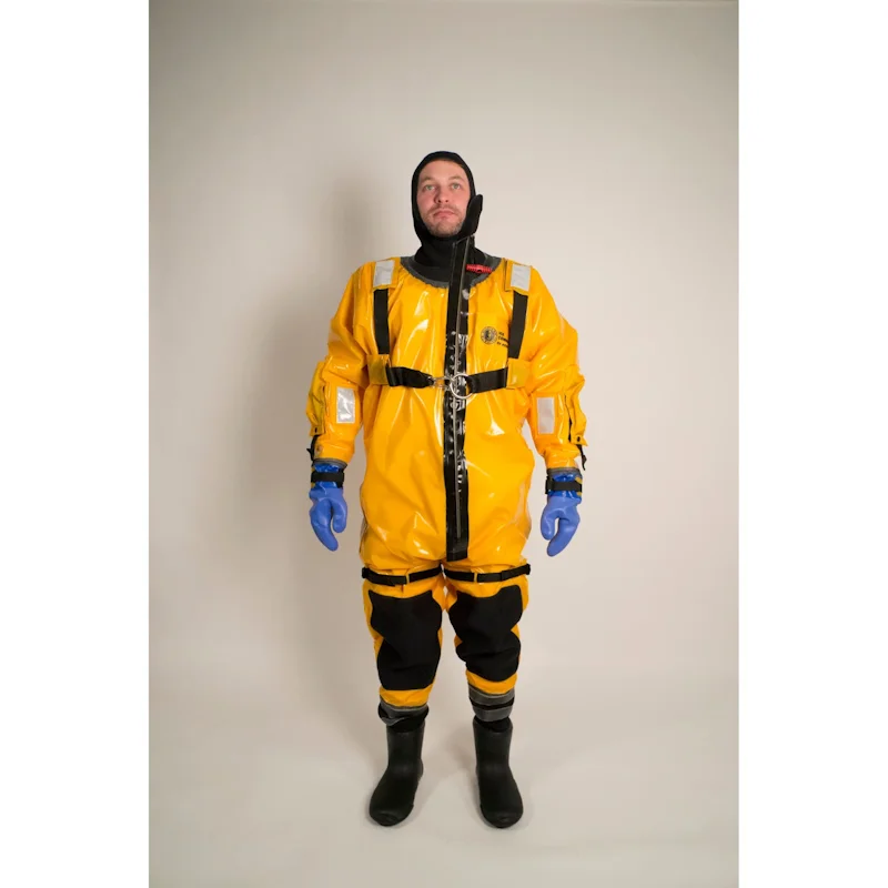 Person wearing Mustang Survival® Ice Commander Rescue Suit shown from the front, highlighting fit and protective features.