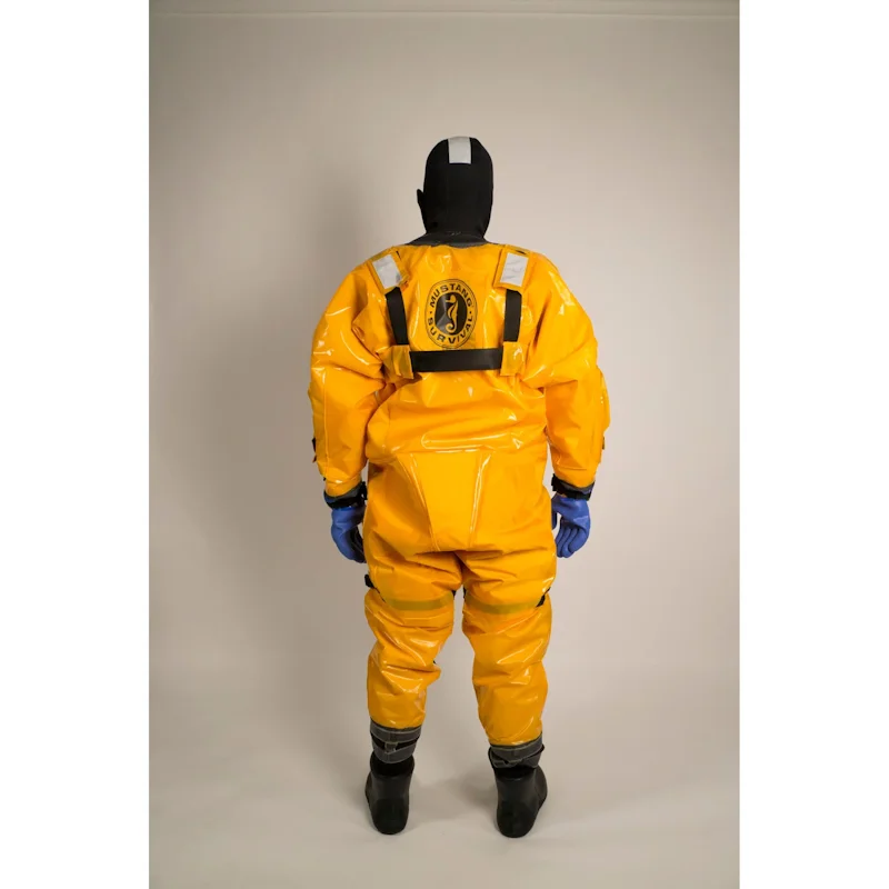 Back view of person in Mustang Survival® Ice Commander Rescue Suit showing reflective markings and suit construction.