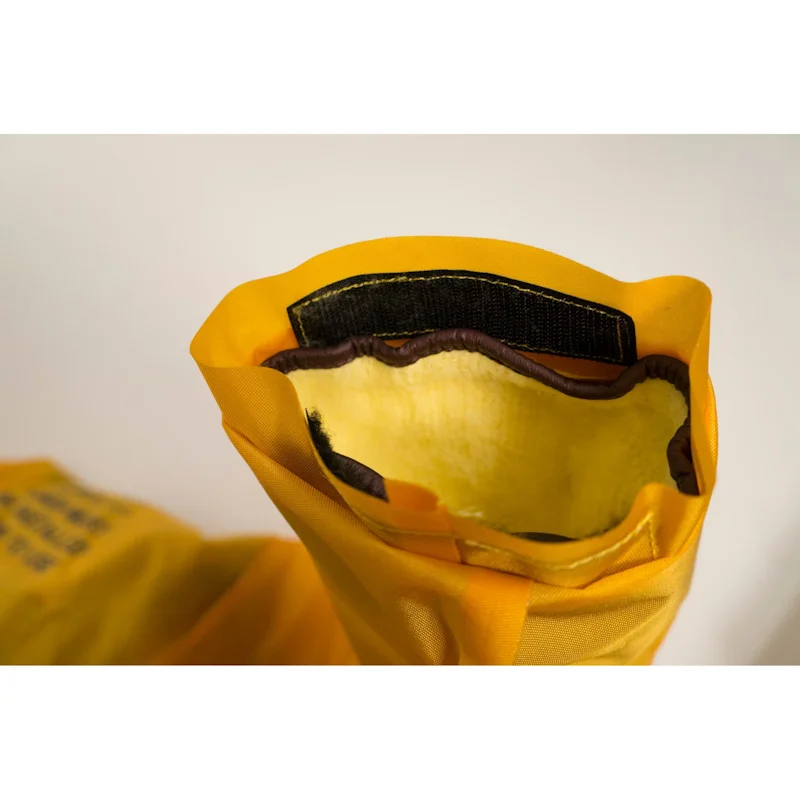 Close-up inside view of the suit sleeve interior on the Mustang Survival® Ice Commander Rescue Suit, highlighting the smooth waterproof lining, reinforced construction, and durable protective materials.