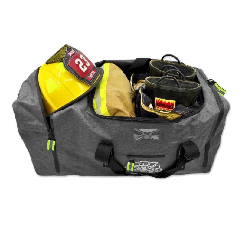 Front view of Lightning X LXFB99 with compartments open and fully packed with firefighter gear, showing organized storage capacity.