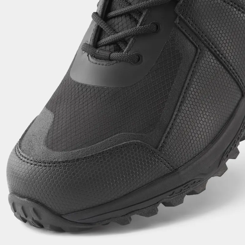 Closeup of a single left-footed NRS Storm Boot from the front left side, highlighting the insulated upper, reinforced toe, and detailed stitching.