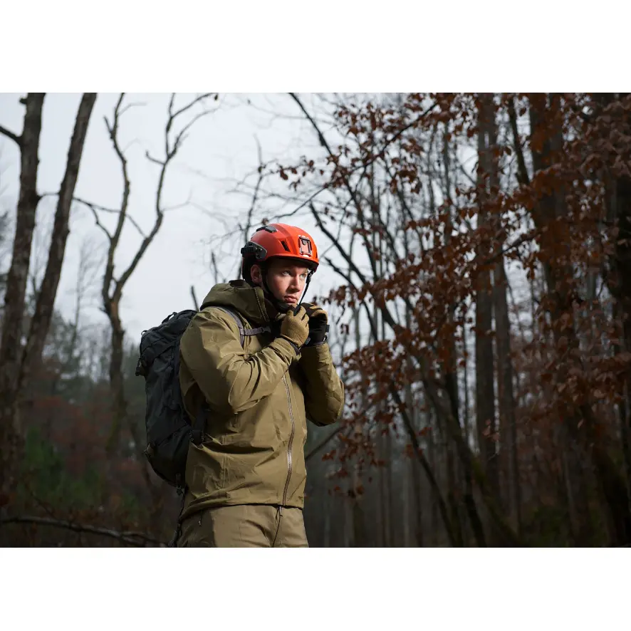 Hiker wearing the Team Wendy SAR Tactical Helmet outdoors demonstrating fit and use in backcountry conditions.