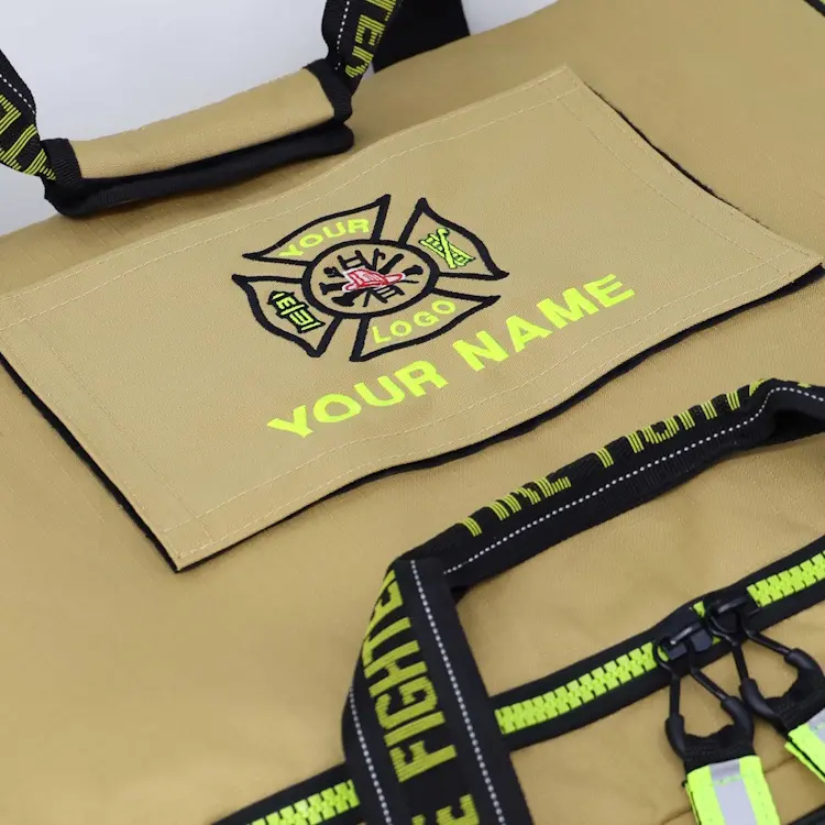Close-up view of the top of Lightning X LXFB10XT 3XL Ripstop Turnout Gear Bag featuring custom logo and ‘Your Name’ embroidery for personalized firefighter gear identification.