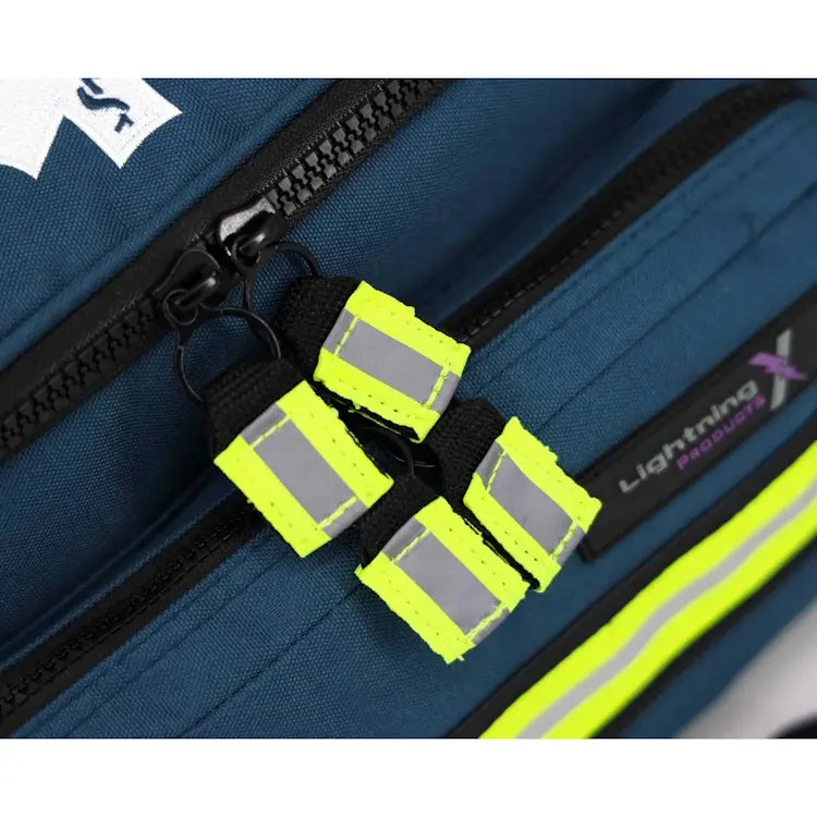Closeup of Lightning X LXMB25 navy blue variant showing front top zippers for secure, easy access to emergency medical supplies.