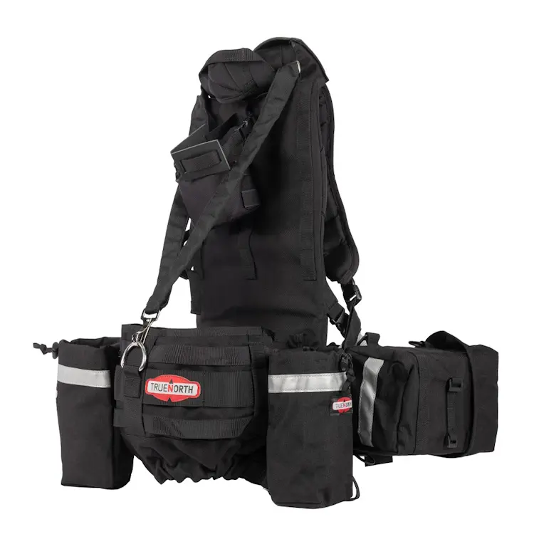 True North Gear Chainsaw Pack featuring durable storage compartments, adjustable straps, and secure chainsaw holder for safe transport in forestry and firefighting.