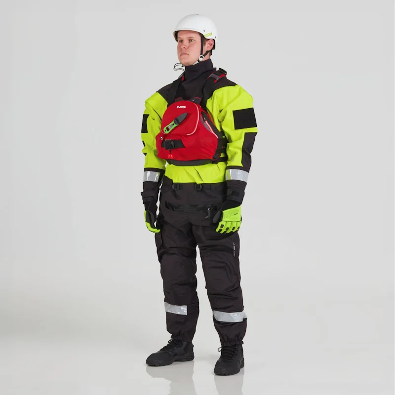 Front side view of a man wearing the NRS Ascent SAR Dry Suit in safety yellow with an equipment bag on the chest, showcasing the waterproof material and rescue gear readiness.