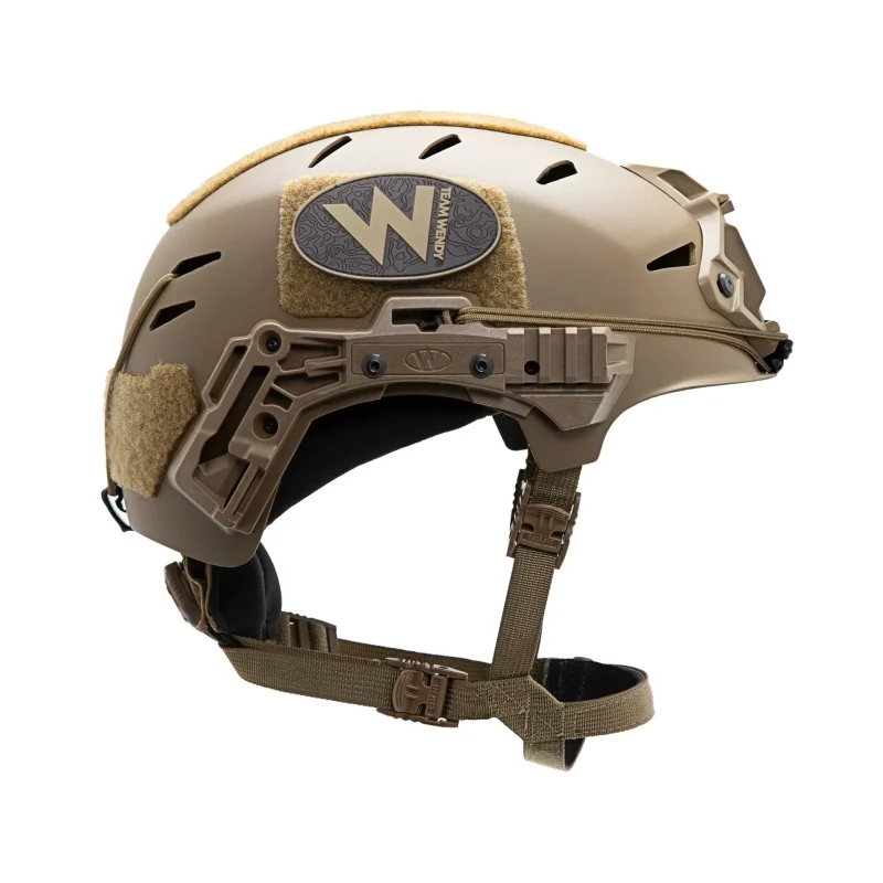 Right side view of Team Wendy® EXFIL® Carbon Bump Helmet in coyote brown showing sleek carbon fiber design and impact-resistant shell.