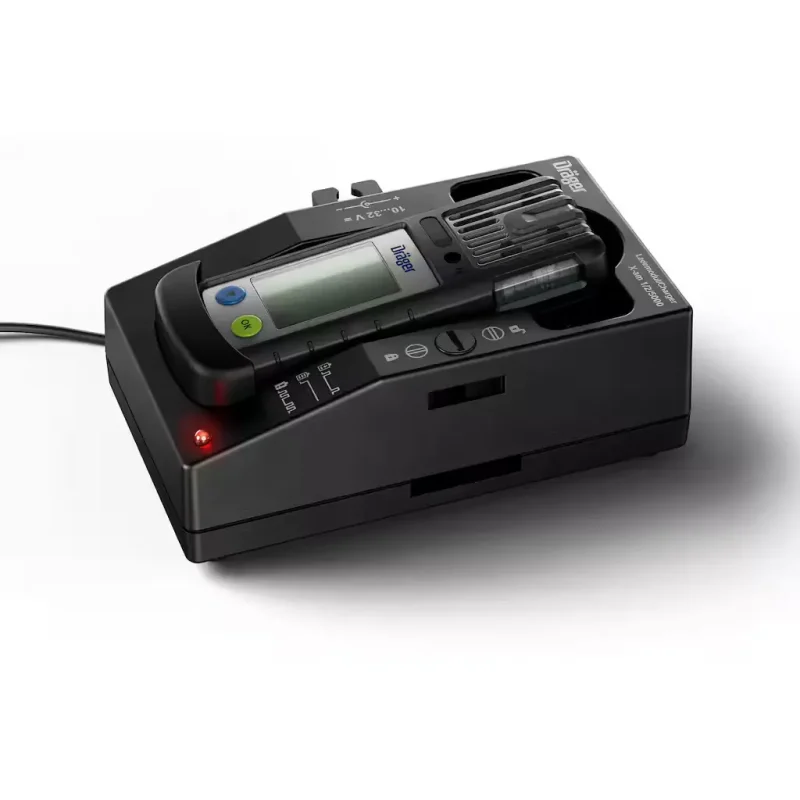 Dräger X-am® 2800 Multi-Gas Detector laying down in its charging cradle with charging cable connected.
