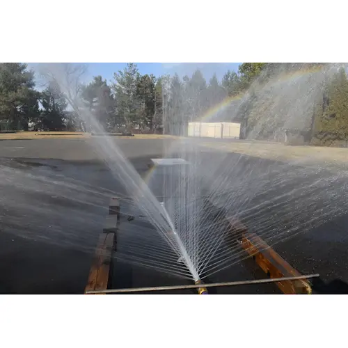 Closeup of Ziamatic™ Vehicle Cooling Unit spraying a fine water mist to provide effective heat reduction and firefighter protection.
