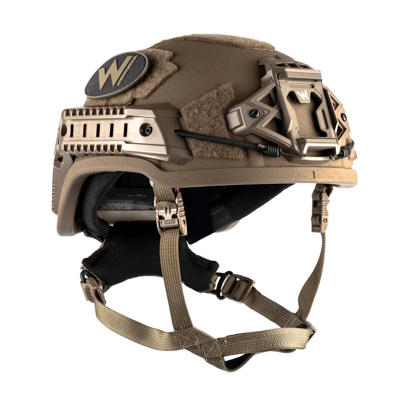 Front-right side view of the Team Wendy® EPIC™ Specialist Ballistic Helmet in coyote brown, emphasizing the tactical finish and modular mounting points for communication or lighting gear.