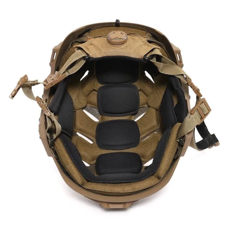 Under view of the Team Wendy® EXFIL® Carbon Bump Helmet in coyote brown, displaying the padded liner, adjustable chin straps, and interior suspension system.