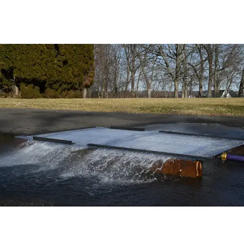 Ziamatic™ Vehicle Cooling Unit sitting on the ground inactive, showing sturdy construction and compact design for easy deployment at emergency scenes.