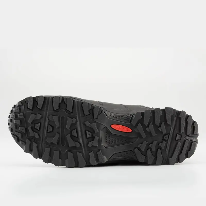 Under view of a single right-footed NRS Storm Boot laying on its side, displaying the durable textured sole designed for excellent traction.