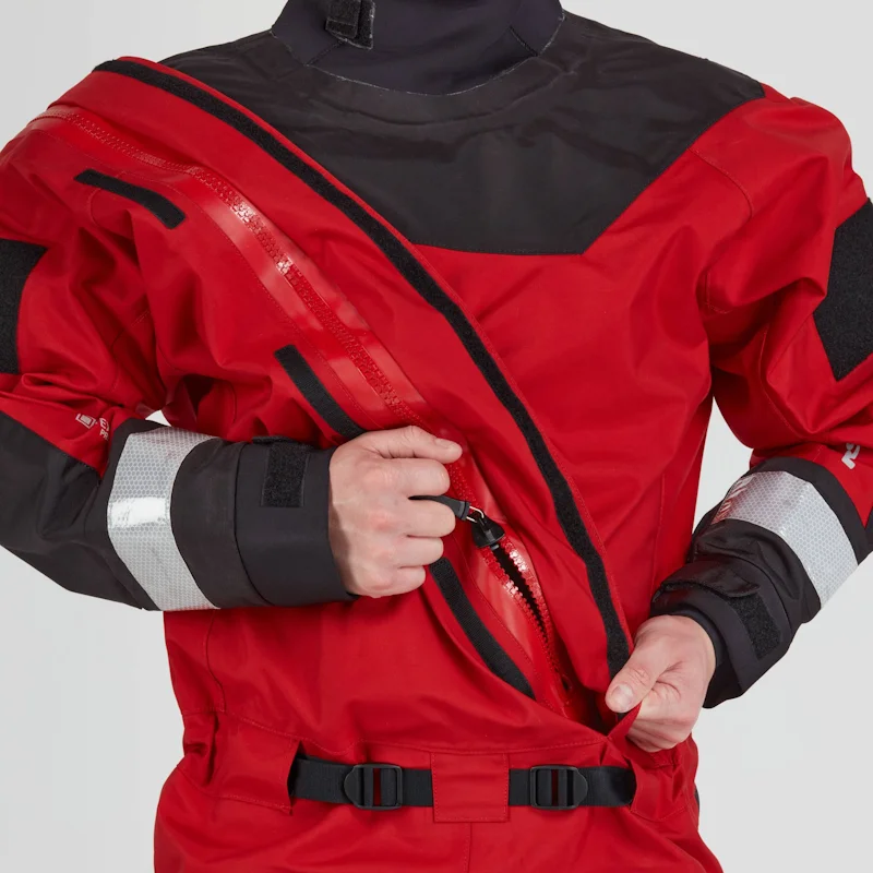 Closeup of a man wearing the NRS Ascent SAR Dry Suit in red, adjusting the heavy-duty front zipper on the chest area.