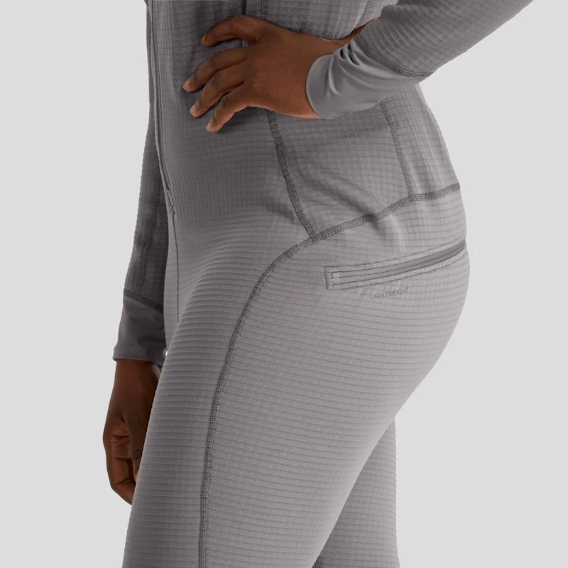 Closeup of a woman wearing the NRS Women’s Lightweight Union Suit, highlighting the hip area and fabric texture to emphasize comfort and flexibility.