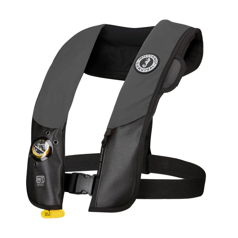 Side front view of Mustang Survival® Hit Hydrostatic Inflatable PFD in black variant highlighting ergonomic fit, inflation cylinder placement, and secure strap system.