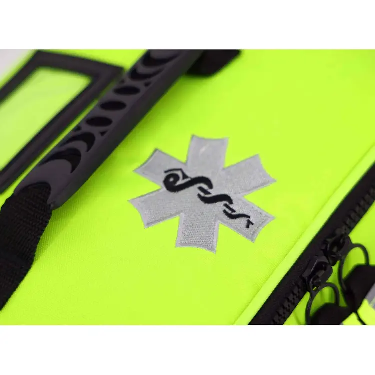 Closeup of Lightning X LXMB25 fluorescent yellow variant showing front top section with prominent medical emblem for quick identification in emergencies.