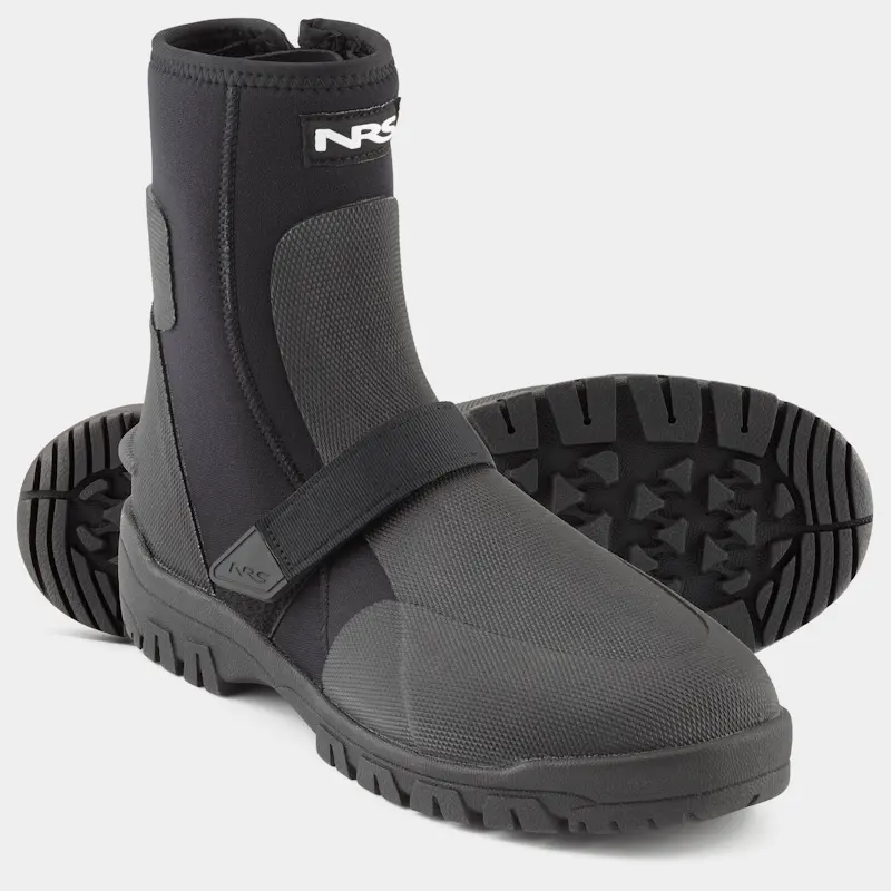 Pair of NRS ATB Wetshoes with one boot standing upright from front right side view and the other boot behind it laying on its side, showing the textured rubber sole for traction.