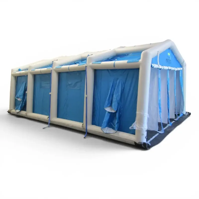 FSI® DAT4070S Mass Casualty Decon Shower, large multi-stall inflatable unit with blue privacy curtains and ground tarp.