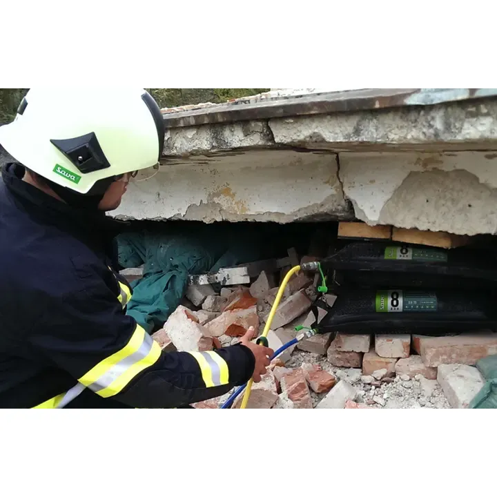 Two Trelleborg™ Conventional Lifting Bags inflated and in use, lifting rubble during rescue operations, showcasing their durable construction and 8 BAR (116 PSI) high-pressure capacity for heavy lifting tasks.