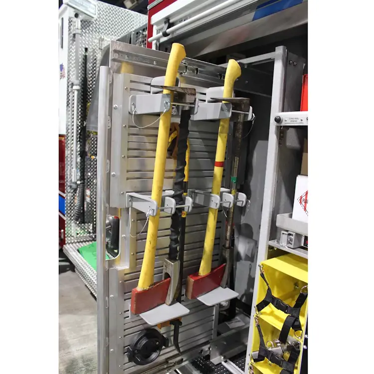 Two axes securely held on a rack by Ziamatic™ QUIC-BAR/Axe Mounting Brackets with Stop, offering organized and reliable storage for quick access during emergency operations.