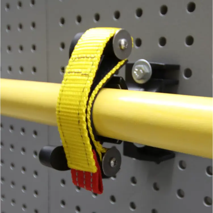 Alternate close front right side view of Ziamatic™ SURE-GRIP 275 Tool/Equipment Mounts mounted and in use, firmly holding firefighting tools for organized and accessible emergency storage.