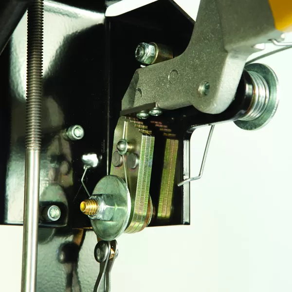 Close-up of an empty Ziamatic™ EZ-LOC Mechanical Bracket with Fixed Top Clamp securely mounted on a firetruck seat, showcasing its sturdy design for reliable equipment holding.