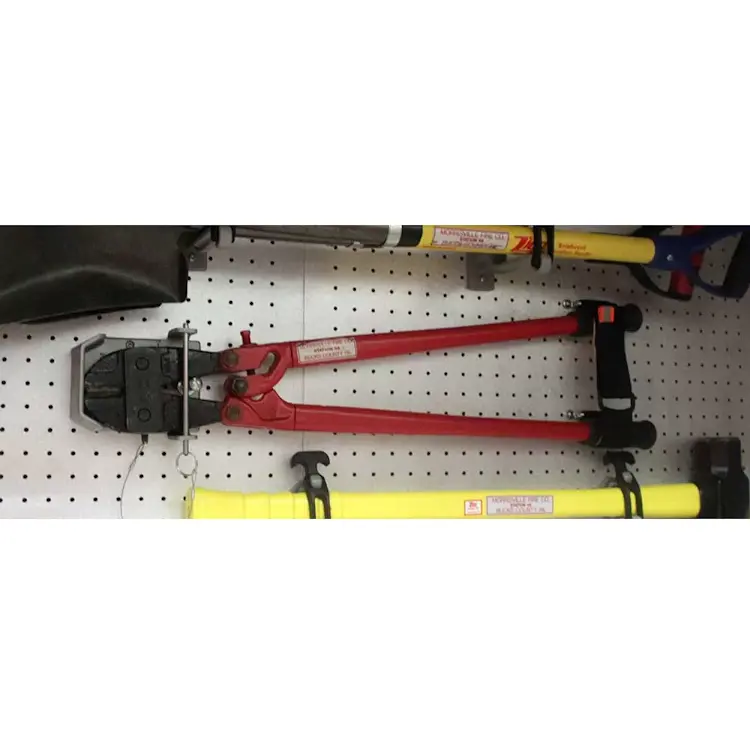 Bolt cutters held horizontally in Ziamatic™ Bolt Cutter Brackets mounted inside a firetruck, ensuring secure and easy access during emergency response.