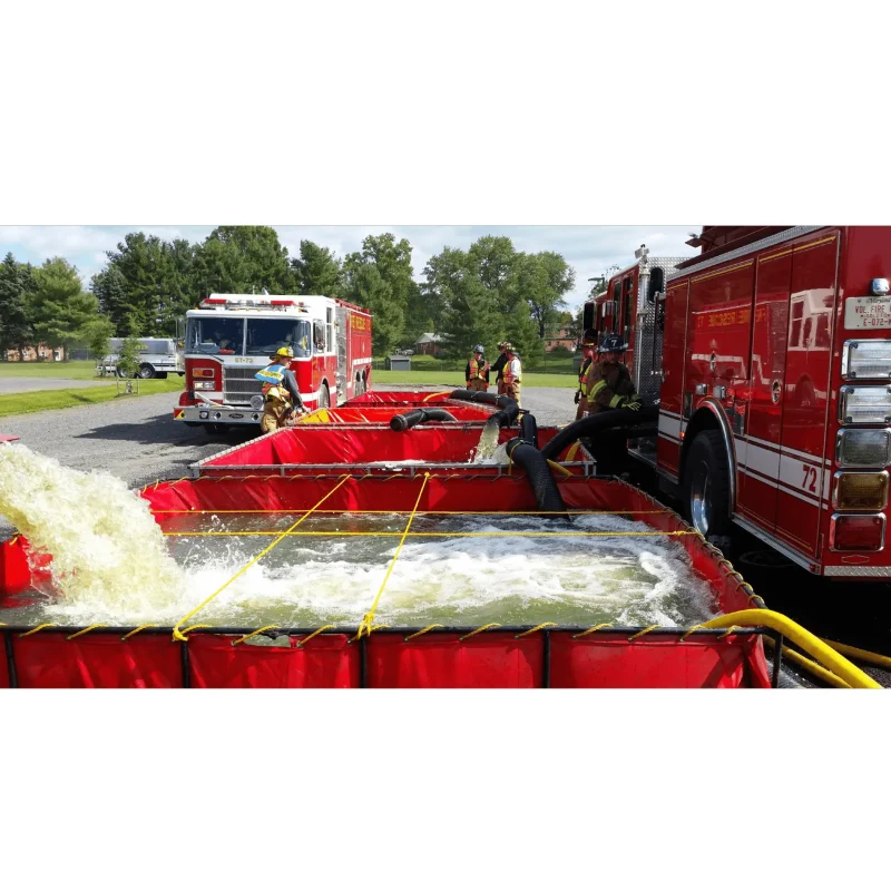 Close-up of multiple FOL-DA-TANK® Portable Folding Frame Tanks being used by firefighters, showcasing their sturdy, collapsible design and efficient water storage capabilities during active firefighting operations.