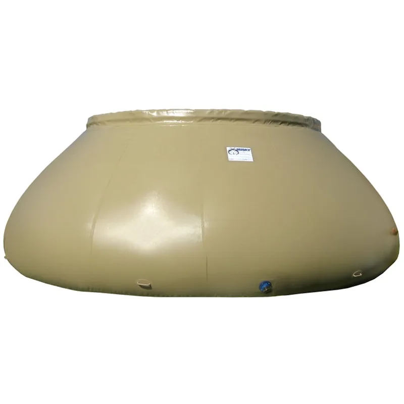Tan Husky® self-supporting frameless portable water tank with a rolled top rim and side fittings for firefighting water supply.