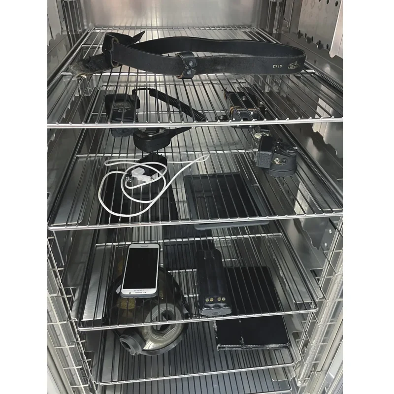 Close-up inside the Cres Guard® Mobile Decontamination UVC + Heat unit with the door open, revealing the UVC lamps and heating components used for thorough equipment disinfection.