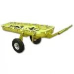 A rugged International Stretcher Systems Anchor Man Trailer designed for off-road patient transport, featuring large wheels, a sturdy metal frame, and secure mounting points for stretchers and rescue equipment.