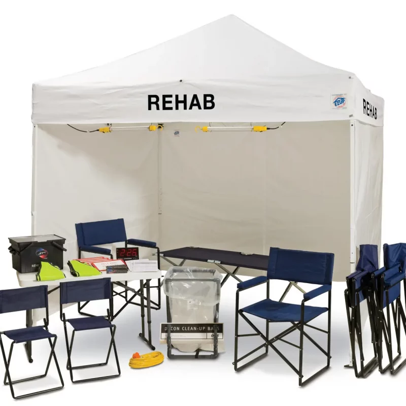 A portable DQE® RHK1000 Rehab Shelter Package featuring a collapsible shelter frame and protective fabric designed to provide on-site rest and rehabilitation space for emergency responders.