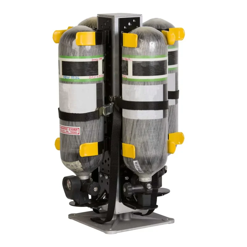 Front view of the Ziamatic™ QUIC-INDEX Multiple Bracket Holder fully stored with four SCBA cylinders secured by WALKAWAY Spring Clip Brackets, showcasing compact, space-saving organization for fire apparatus compartments.