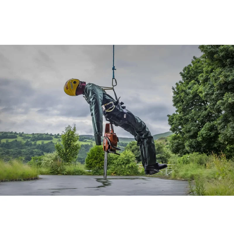 Side view of a Ruth Lee™ Working at Height Training Manikin being lifted, demonstrating realistic weight distribution and secure rigging for high-angle rescue training.