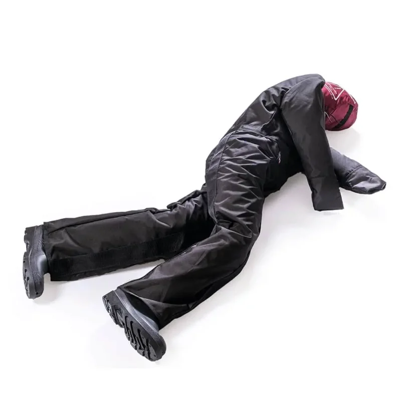 A Ruth Lee™ Duty Training Manikin lying down on its side, used for realistic casualty simulation during emergency rescue training.