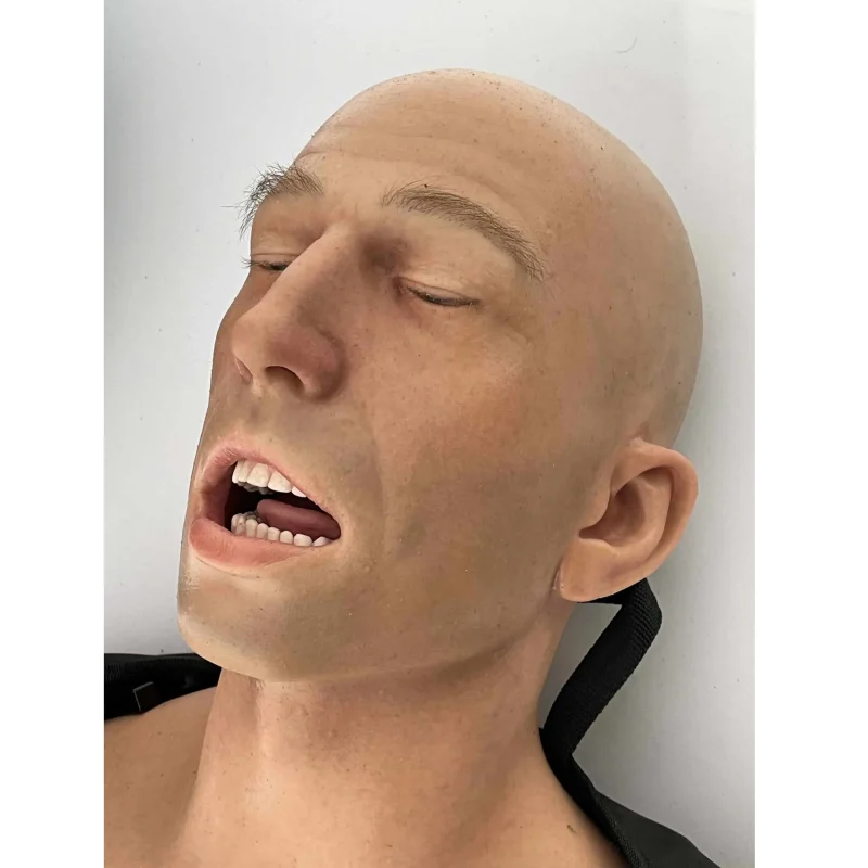 Close-up of the head of a Ruth Lee™ Advanced Water Rescue Manikin with mouth open, designed for realistic airway management and rescue training.