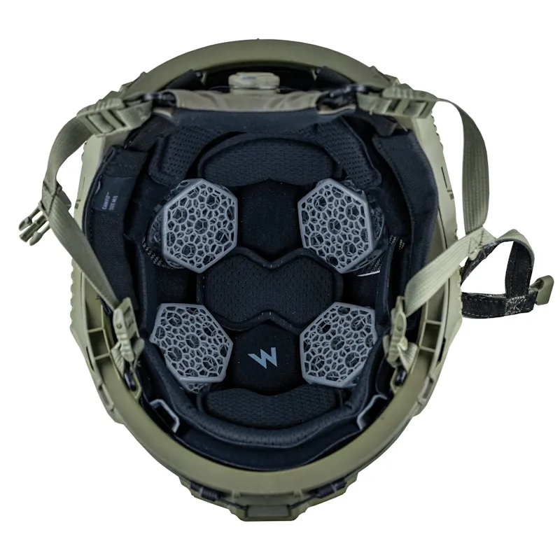 Top-down interior view of the Team Wendy® helmet in Ranger Green highlighting the impact liner system, comfort padding, and adjustable retention straps for enhanced fit and protection.