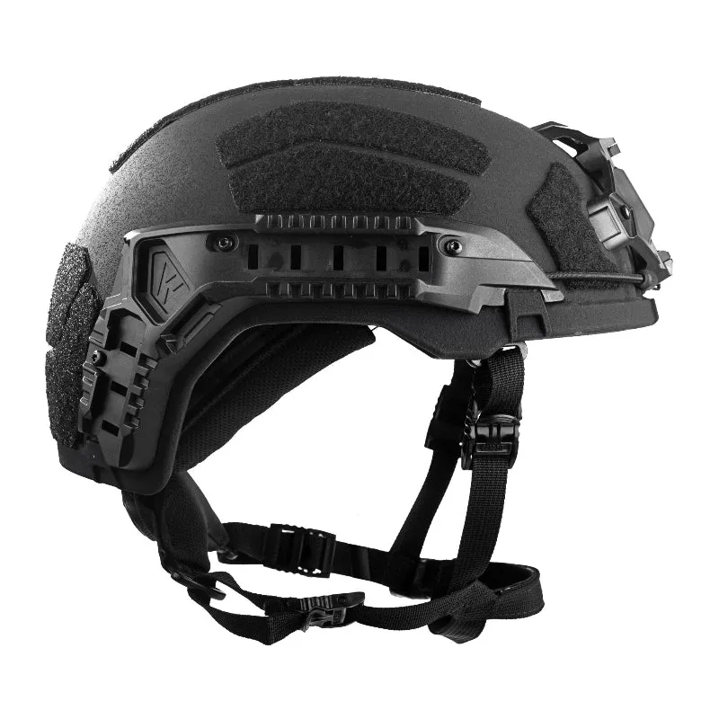 Side profile view of the Team Wendy® tactical helmet in Black featuring integrated accessory rails, hook-and-loop mounting panels, and an adjustable chin strap system for tactical and law enforcement applications.