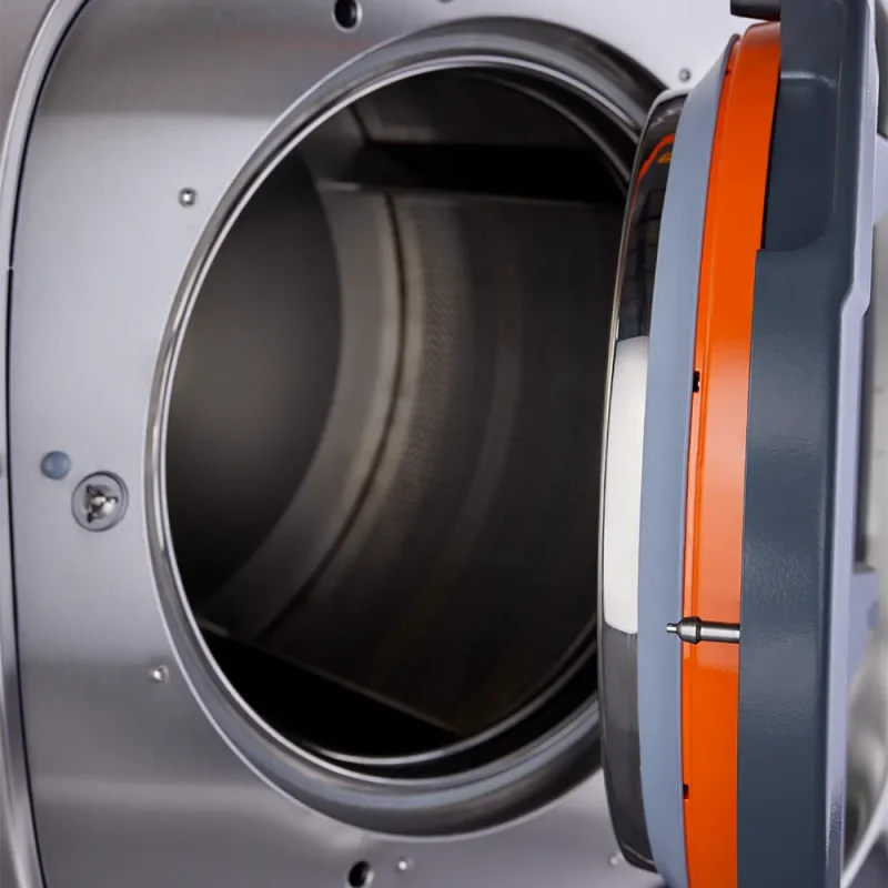 Close-up of Ready Rack™ Smart-Wash 88 extractor washer door showing heavy-duty construction and secure locking mechanism.