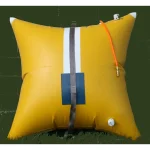 Yellow Matjack MJEP-1000 underwater pillow bag with reinforced center strap, orange fill hose, and dual valve ports.