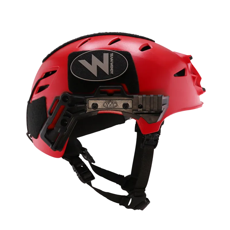 Team Wendy® EXFIL® Rescuer Bump Helmet in red with accessory rail mount and adjustable chin strap.